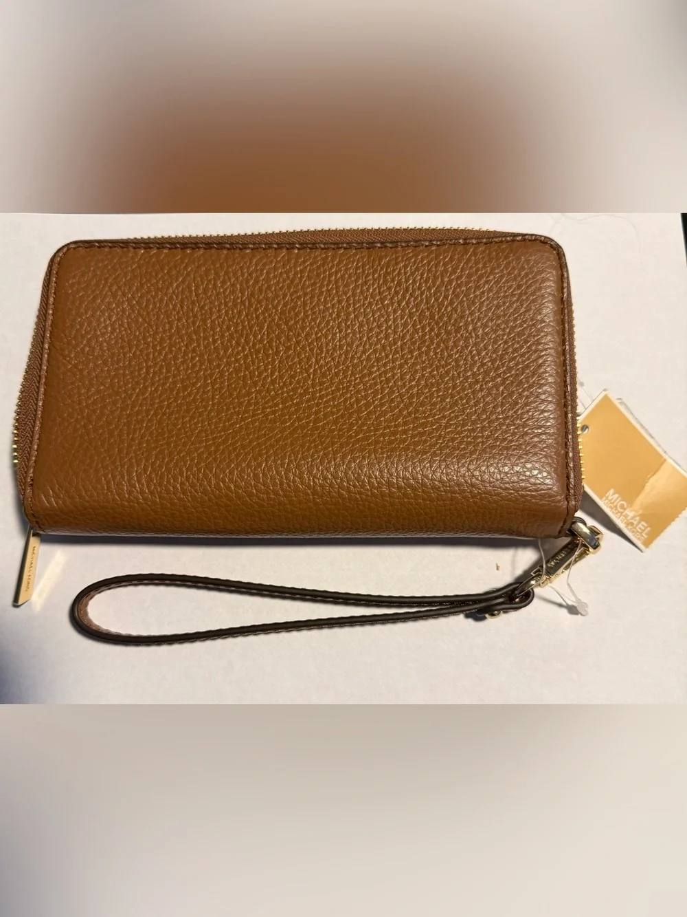 Michael Kors Tan Pebbled Leather Wristlet with Gold Logo